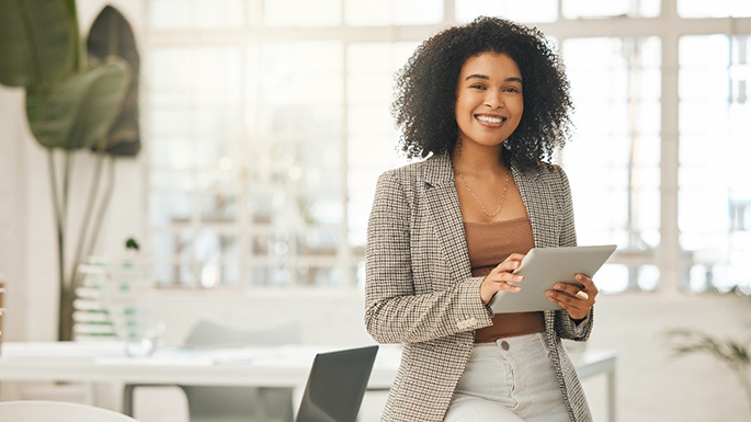 a businesswoman resting on a desk