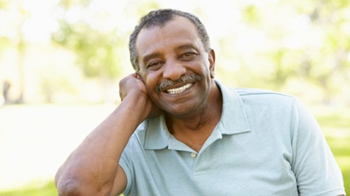 Older man in Philadelphia after cosmetic dental bonding