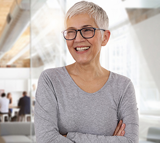 Smiling older woman in an office