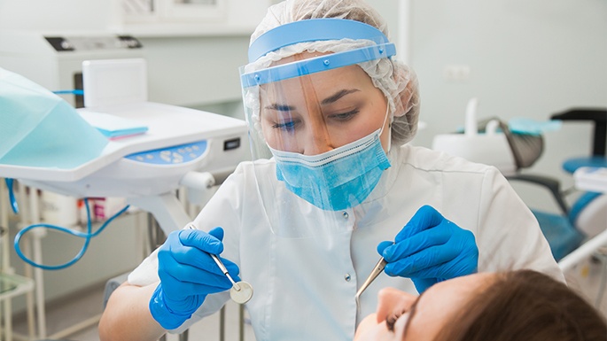 Doctor Aloian treating dental patient