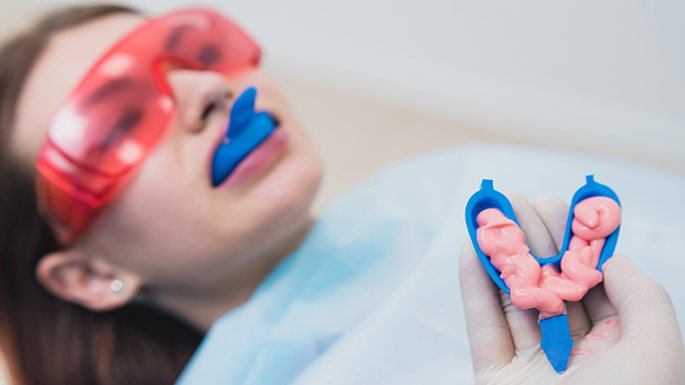 Patient receiving fluoride treatment