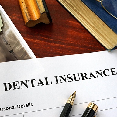 Dental insurance form on a table