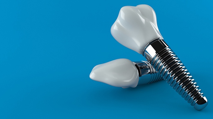 Dental implant on a blue background