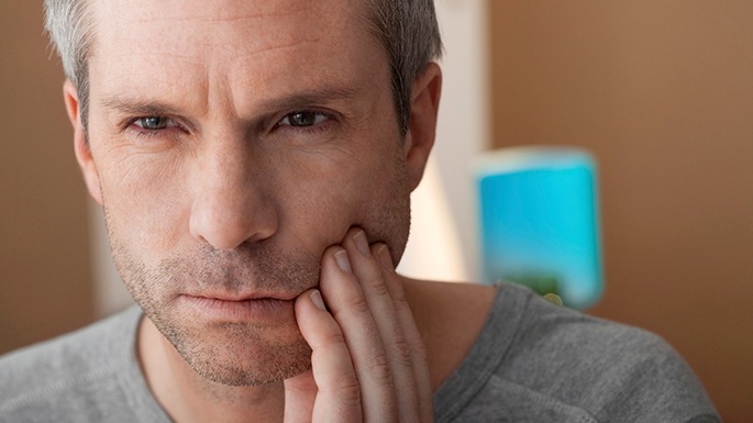 Man with tooth pain