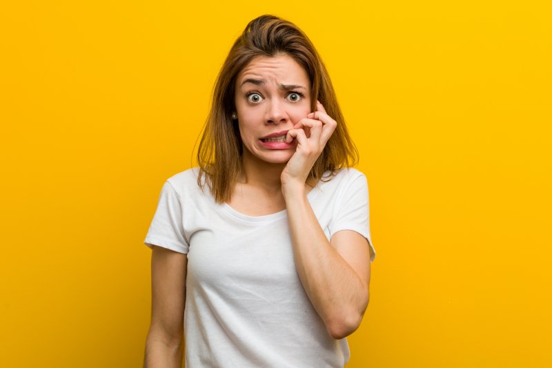 woman worried and biting her nails in Philadelphia