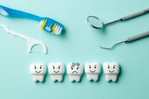Teeth lined up with one unhappy one in the middle.